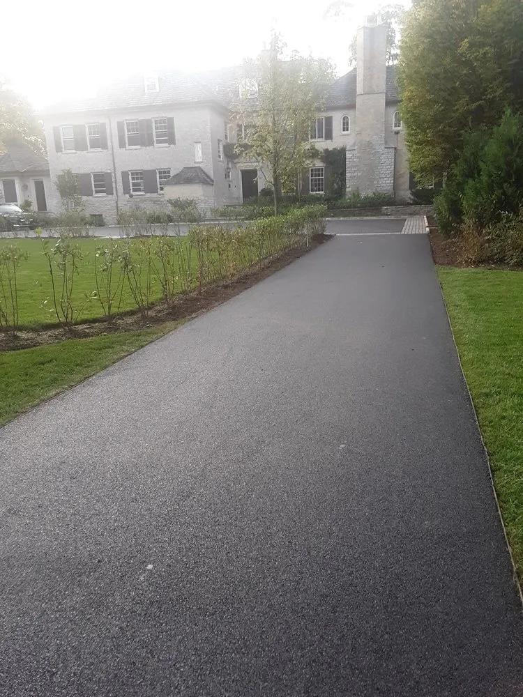 Reliable lawn mowing service with custom design across Waukegan, IL - United Asphalt Services