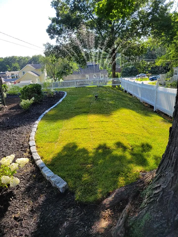 Custom landscaping services for homes in East Hartford, CT by United Landscaping & Tree Services