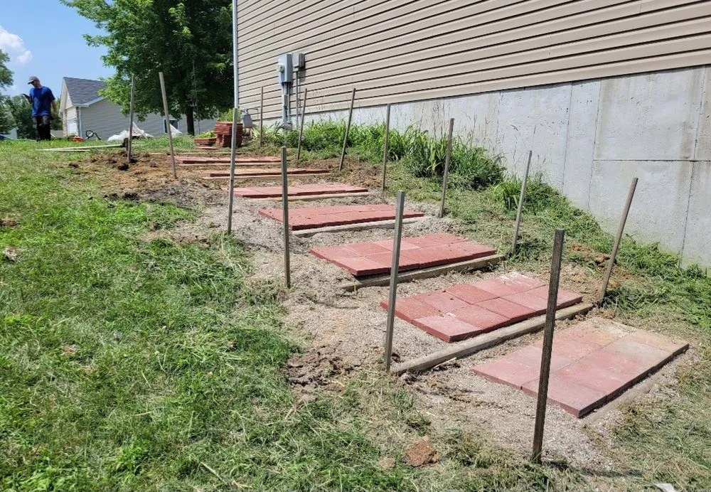 Affordable landscape installation for beautiful yards in Swansea, IL by Universal Lawns & Outdoors