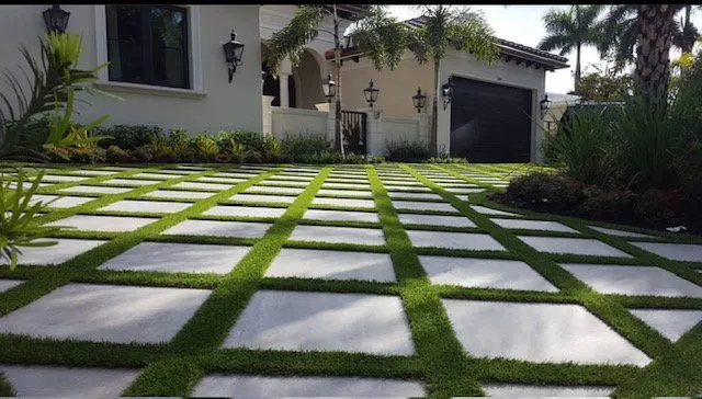 Professional yard cleanup service for residential properties in Hialeah, FL by Unlimited Grass