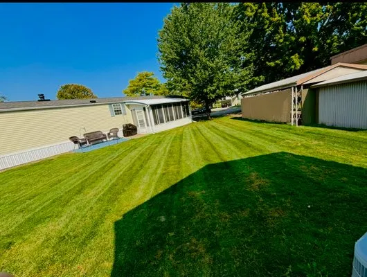 Unlimited landscaping Logo