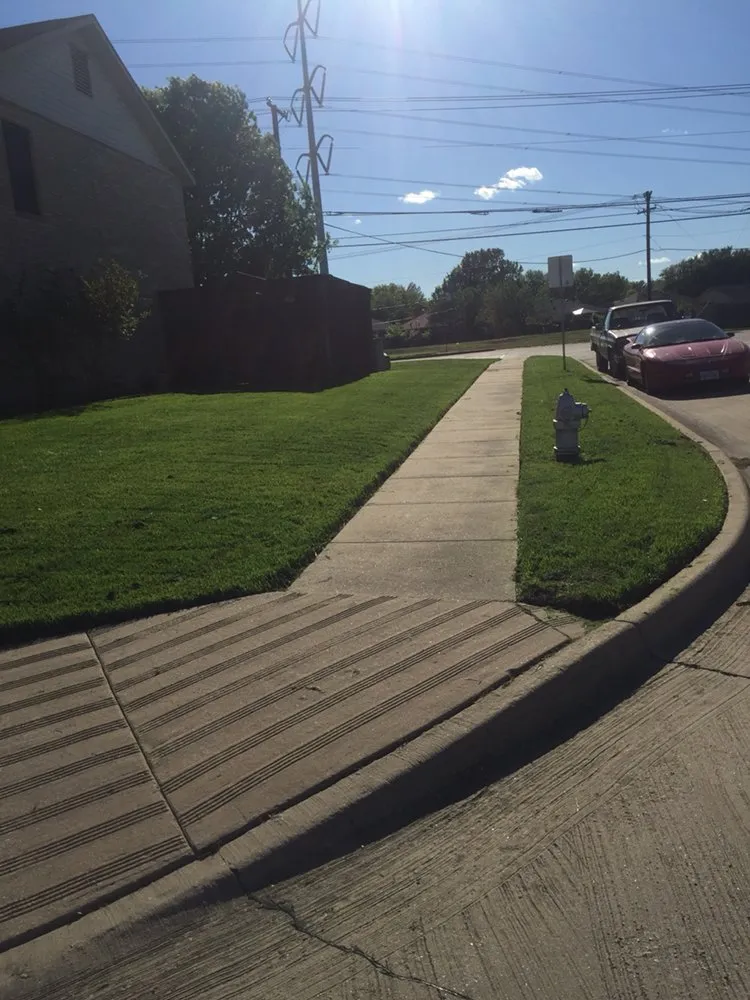 Custom garden landscaping with custom design in Cleburne, TX by Unlimited Lawn and Landscape