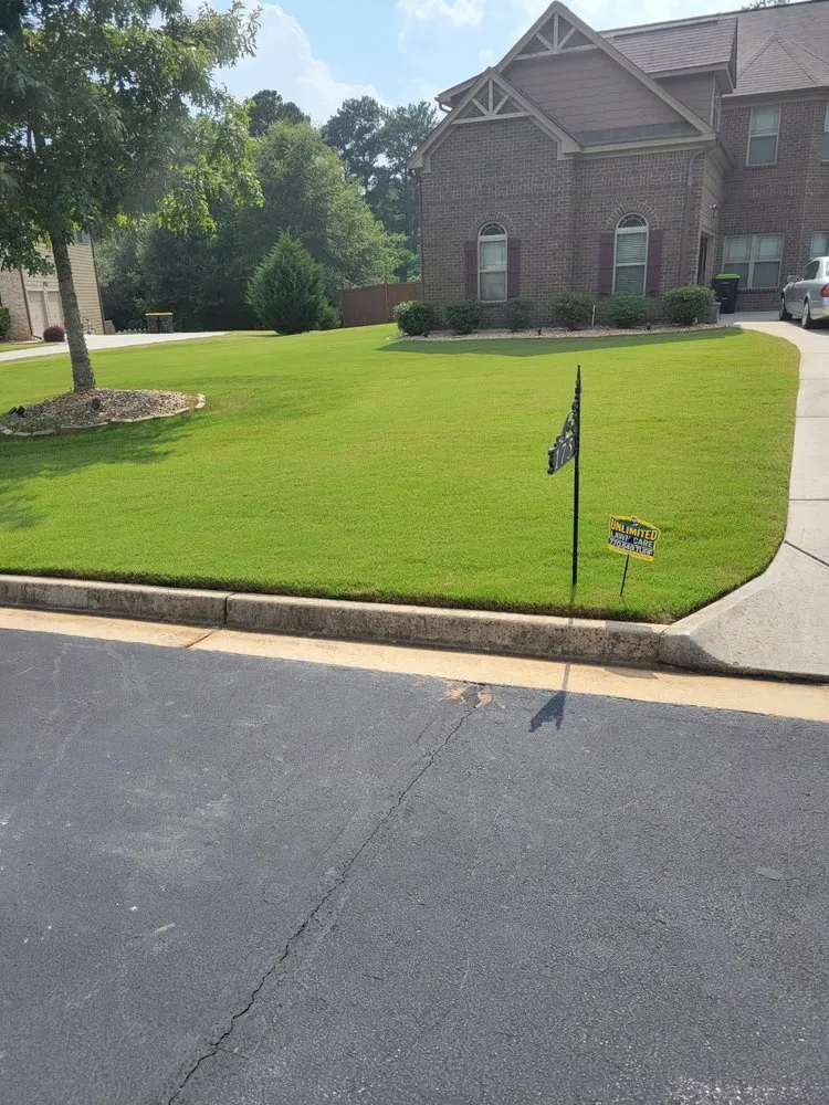 Professional landscape installation for homes in Conyers, GA by Unlimited Lawn Care