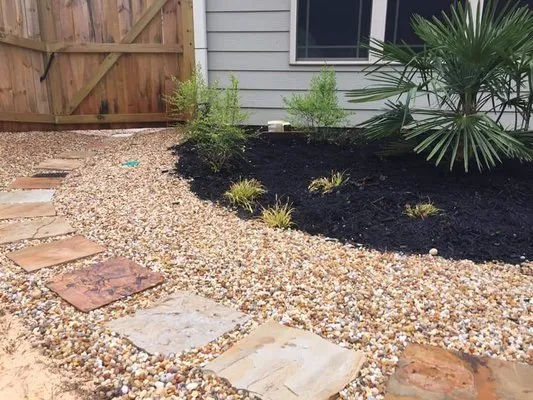 Unquie Landscaping Logo