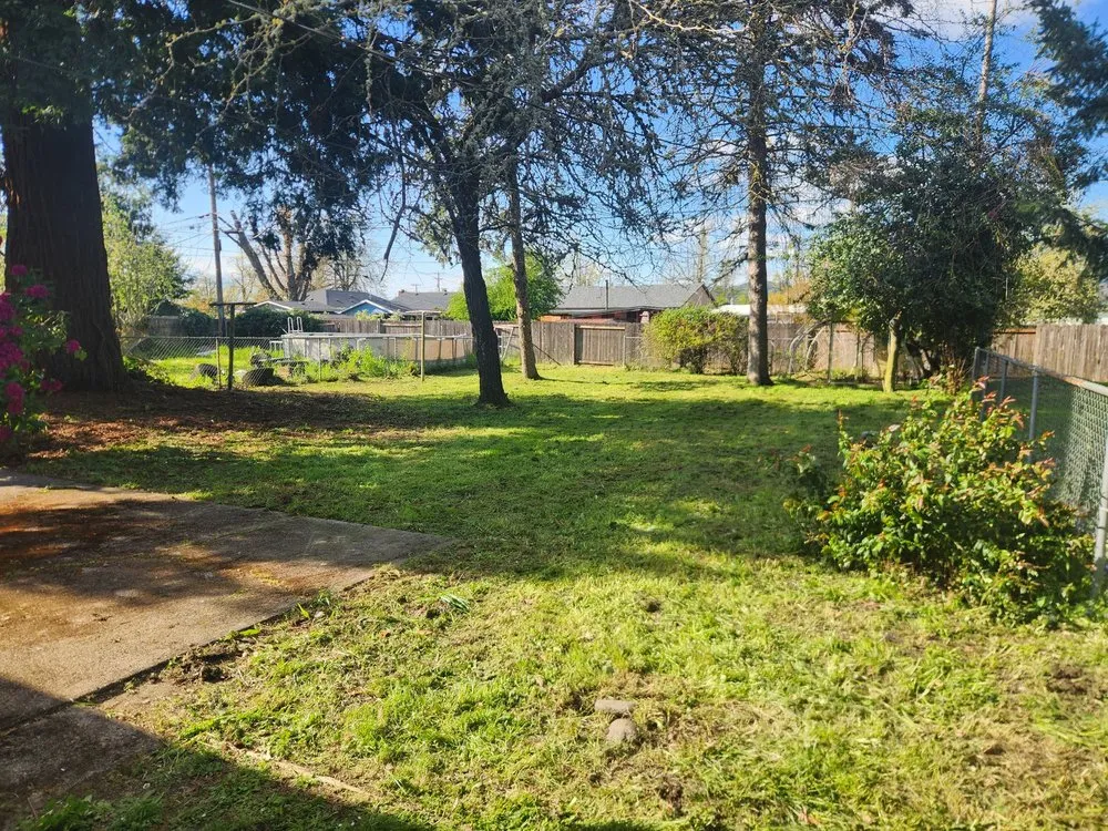 Local lawn mowing service for homes in Springfield, OR by Untouchable Choices