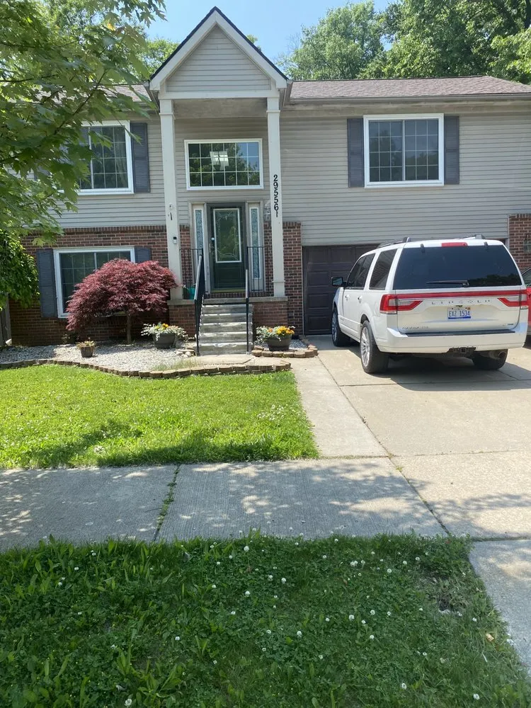 Trusted lawn mowing service experts serving Lincoln Park, MI - Up Charged