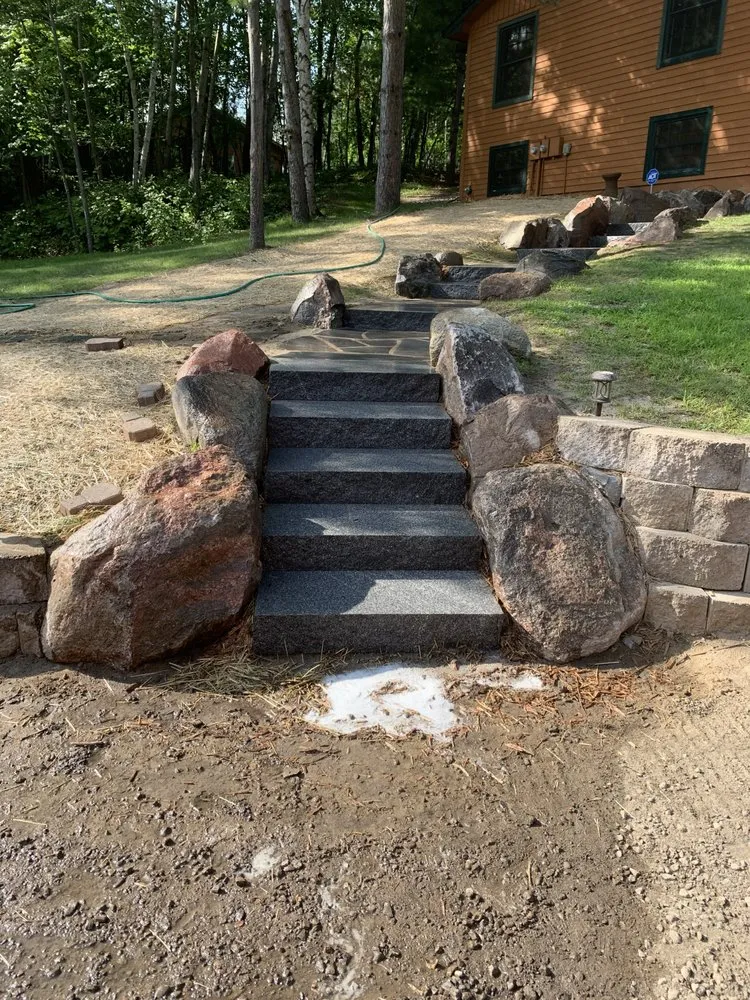 Custom lawn mowing service for year-round maintenance across Clearbrook, MN - UpNorth Landscaping