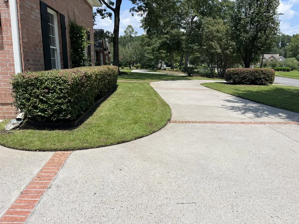 Professional lawn mowing service for homes in Savannah, GA by Upper Cutz Landscape
