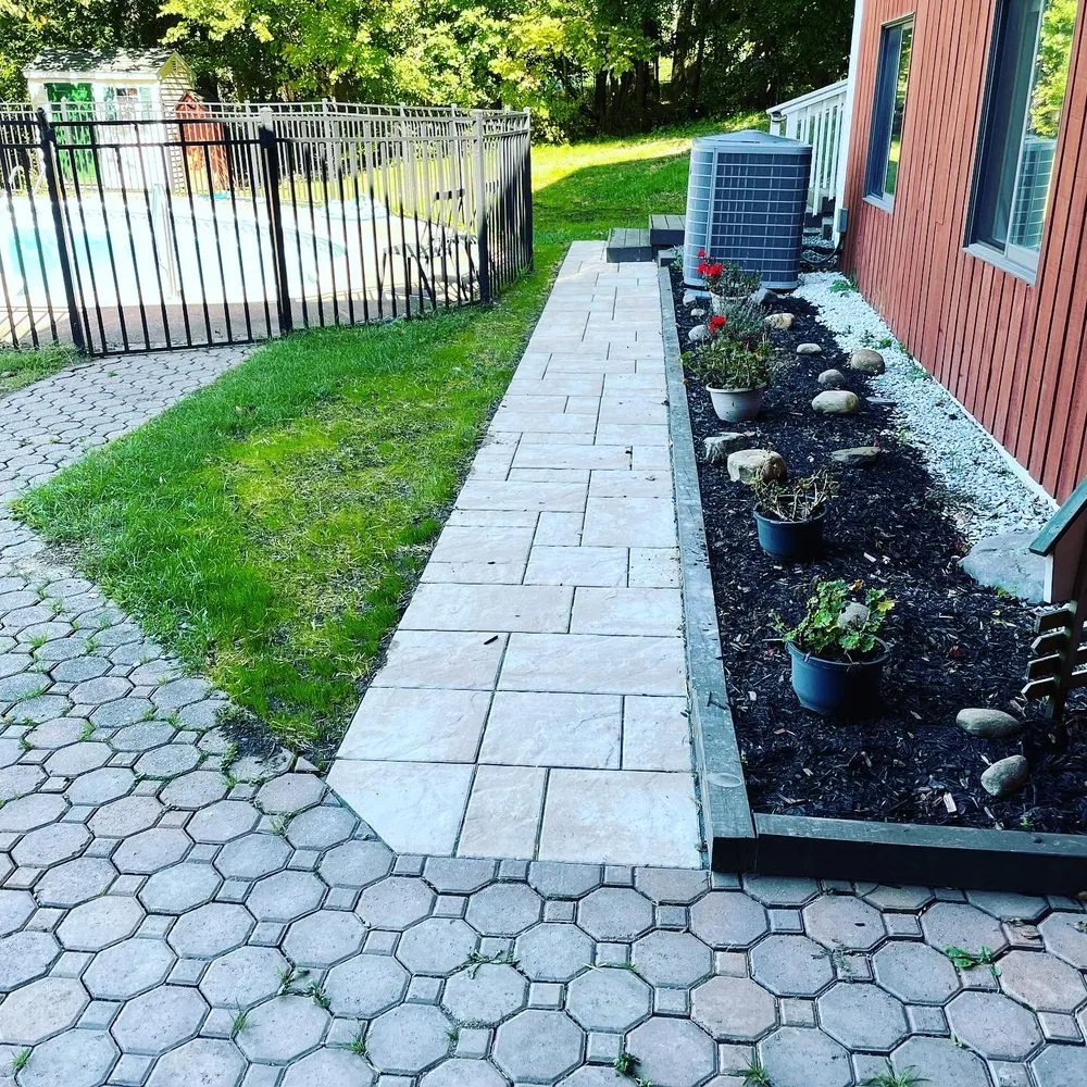 Reliable landscaping services for year-round maintenance in Rensselaer, NY by Upscale Lawn Pros