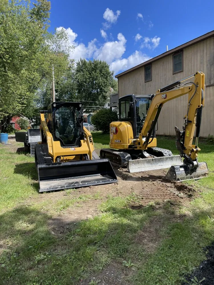 Custom landscaping services for year-round maintenance in Rensselaer, NY by Upscale Lawn Pros