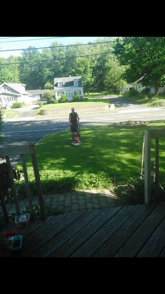 Expert lawn mowing service with custom design in Hoosick Falls, NY by Upstate Laborers