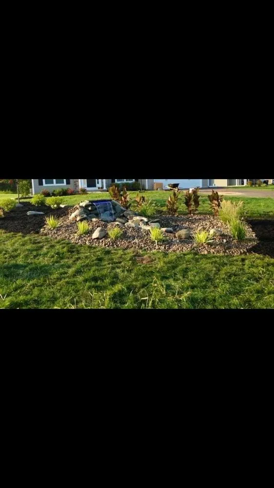 Affordable lawn mowing service for outdoor upgrades across Hoosick Falls, NY - Upstate Laborers