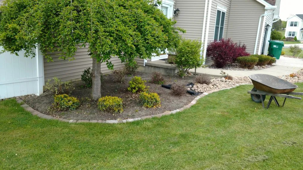 Affordable landscape design for year-round maintenance in Lackawanna, NY by Upstate Landscape & Design