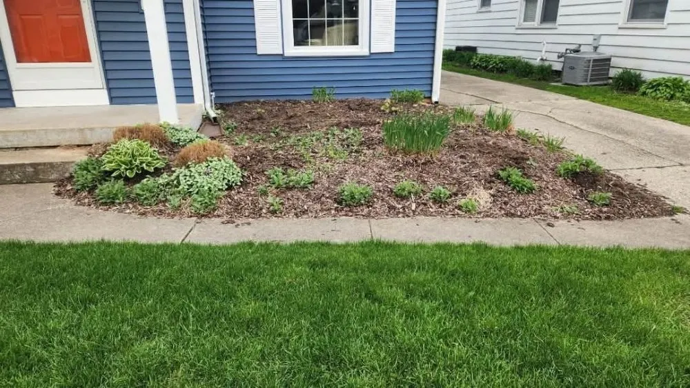 Reliable lawn mowing service for beautiful yards across Belding, MI - Upstream Landscape Maintenance and Design