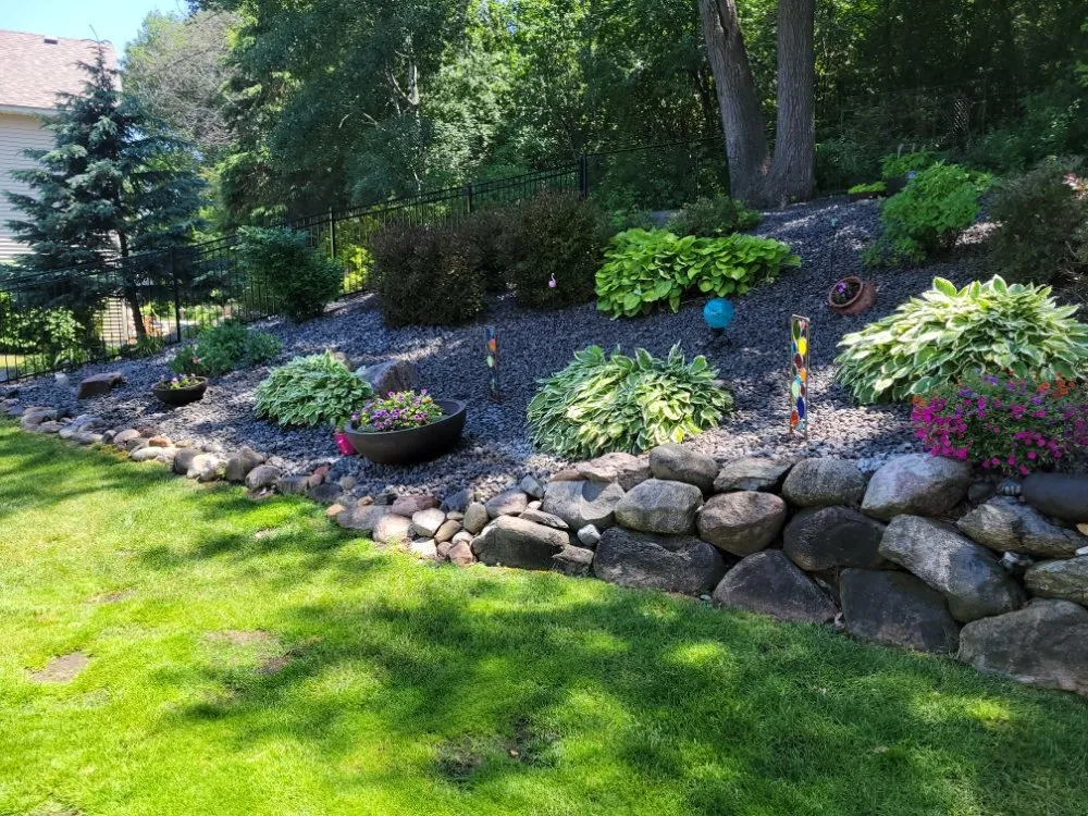 Custom outdoor landscaping experts serving Lakeville, MN - Urban Green Lawncare & Snow Removal