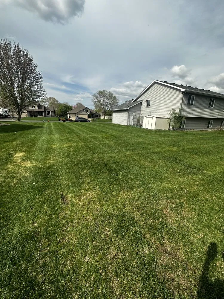 Local lawn mowing service for residential properties in Coon Rapids, MN by Urban Grove Lawn and Landscape