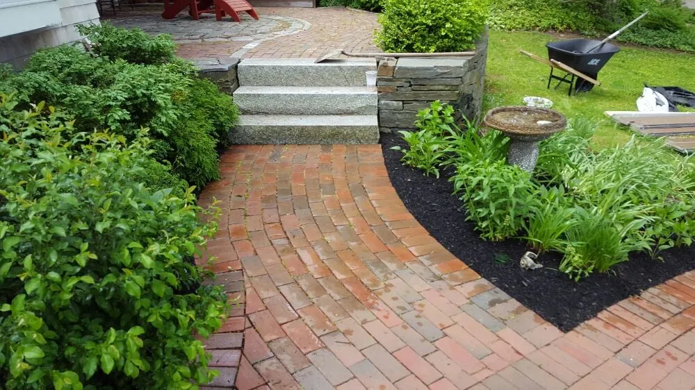 Professional landscape installation with custom design across Portland, ME - UrbanYardology