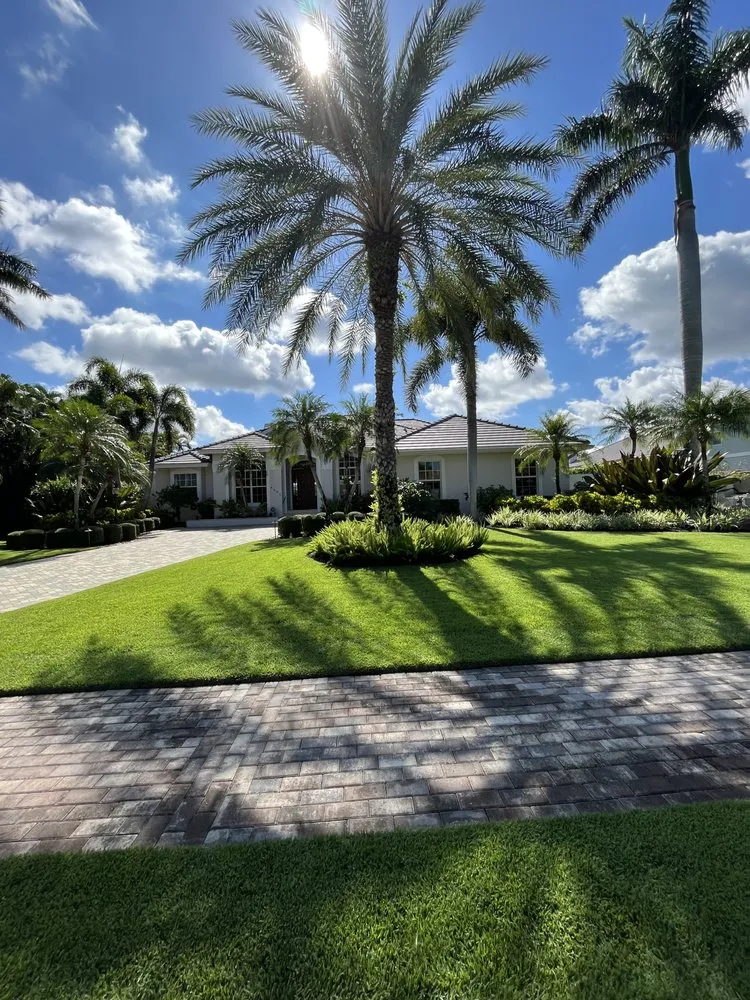 Local landscape design for year-round maintenance in Naples, FL by Urbina Lawn Care
