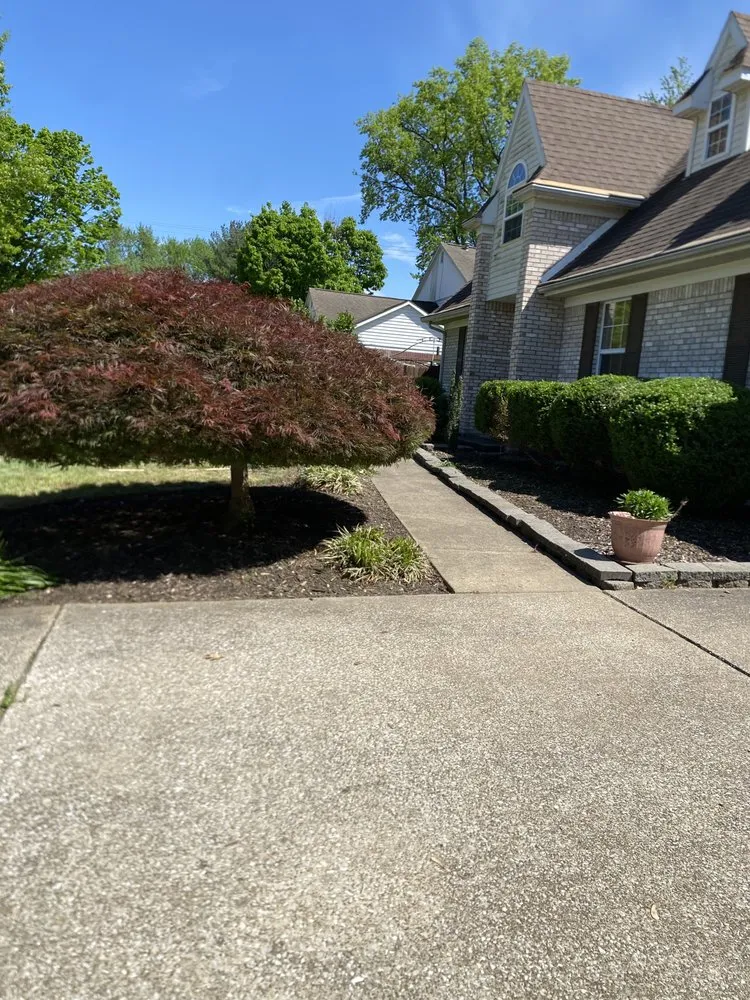 Professional lawn care service for residential properties in Evansville, IN by Uriel Landscaping