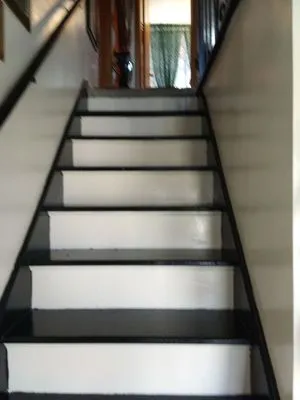 Urvin Remodeling & Lawn Care Logo