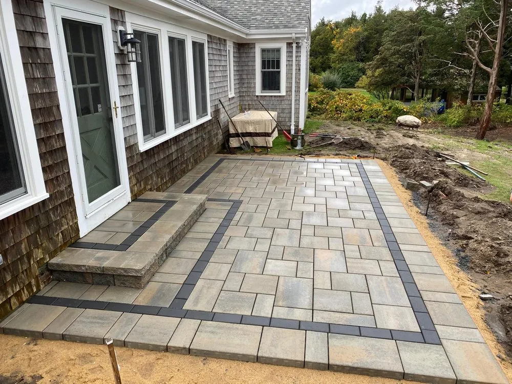 Professional lawn mowing service with custom design in Waltham, MA by US Landscaping & Construction