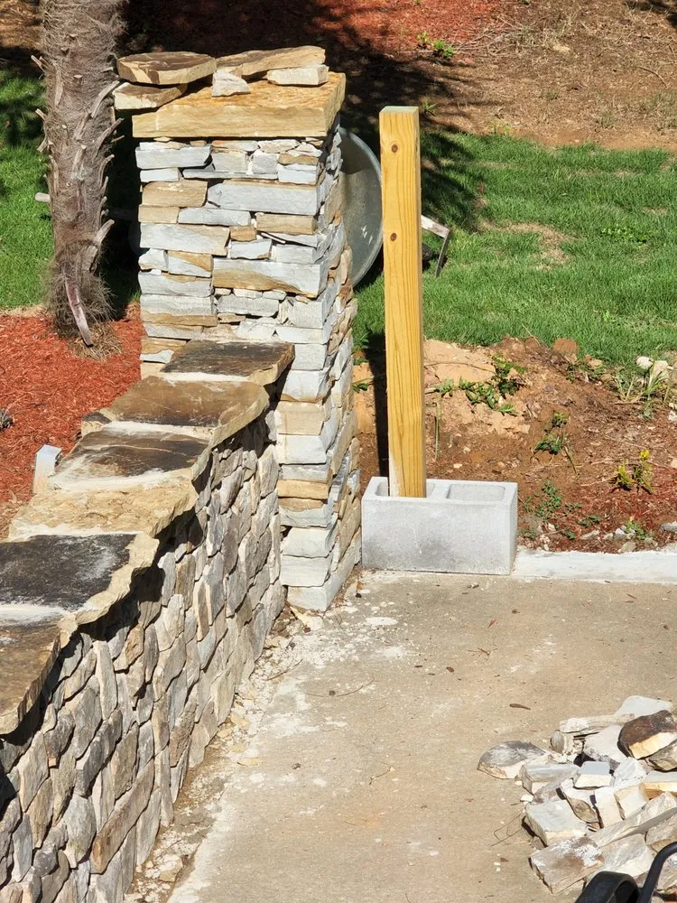 Custom landscape installation with custom design in Pelham, AL by Us Lawns