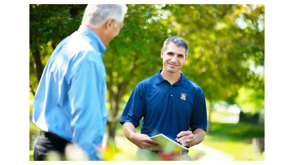 Affordable lawn mowing service for year-round maintenance in Raymore, MO by US Lawns