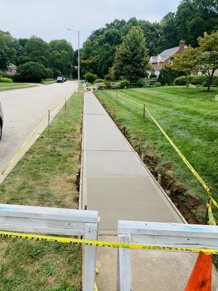 Expert lawn mowing service for residential properties in Eddington, PA by V & R Construction, Landscaping & Cleaning Services