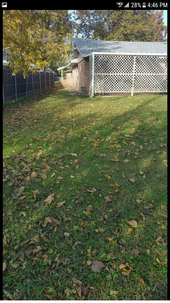 Custom lawn mowing service for residential properties in Oklahoma city, OK by Vail Landscaping and Tree Services