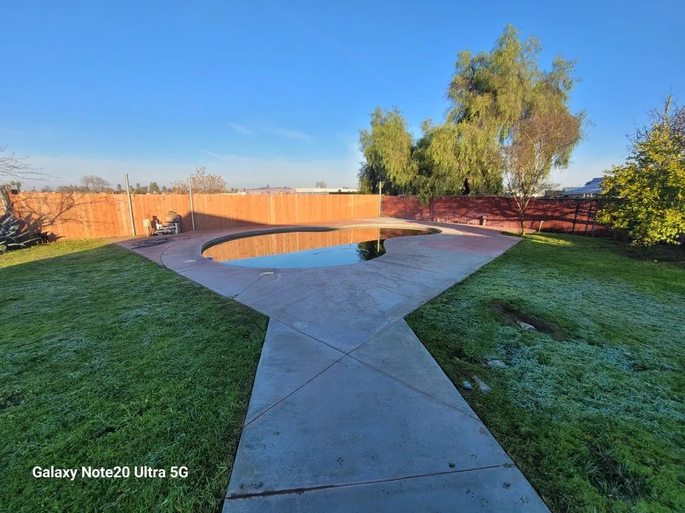 Professional lawn mowing service for outdoor upgrades in Madera, CA by Valencia Landscaping and Tree Services