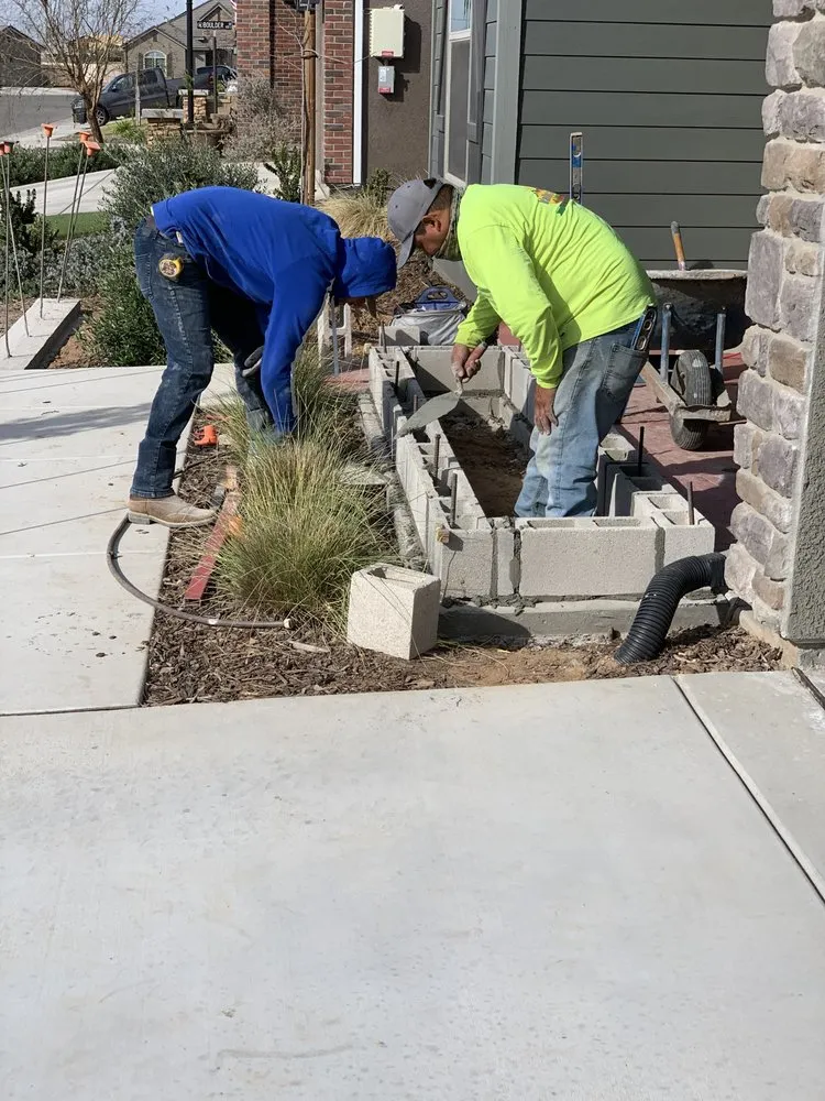 Local lawn mowing service for year-round maintenance in Fresno, CA by Valley Concrete and Landscaping