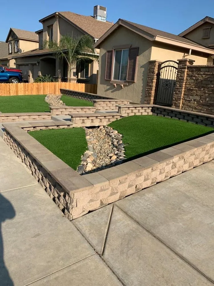Custom yard maintenance for residential properties in Tulare, CA by Valley Home Renovation