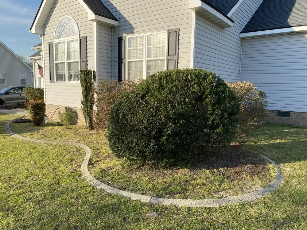 Custom yard maintenance with custom design in Greenville, NC by Valor Landscaping