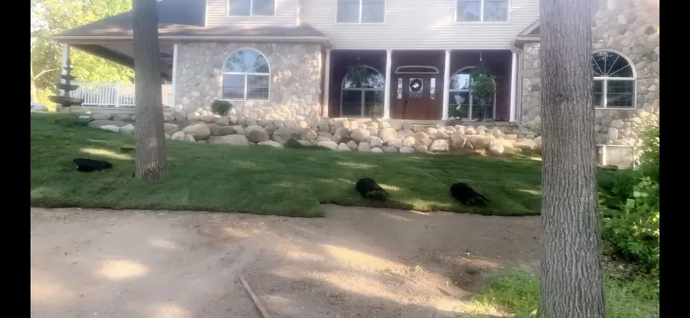 Custom landscape installation for beautiful yards in Lansing, MI by Valy’s Lawnscapes