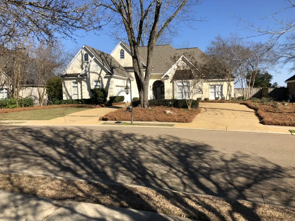 Custom yard maintenance for residential properties in Pearl, MS by Van Buren Lawn & Landscape