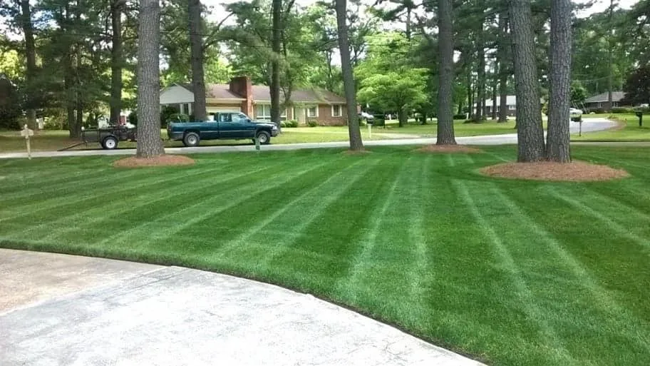 Professional lawn mowing service in Wausau, WI by Van Oosten Lawn Service