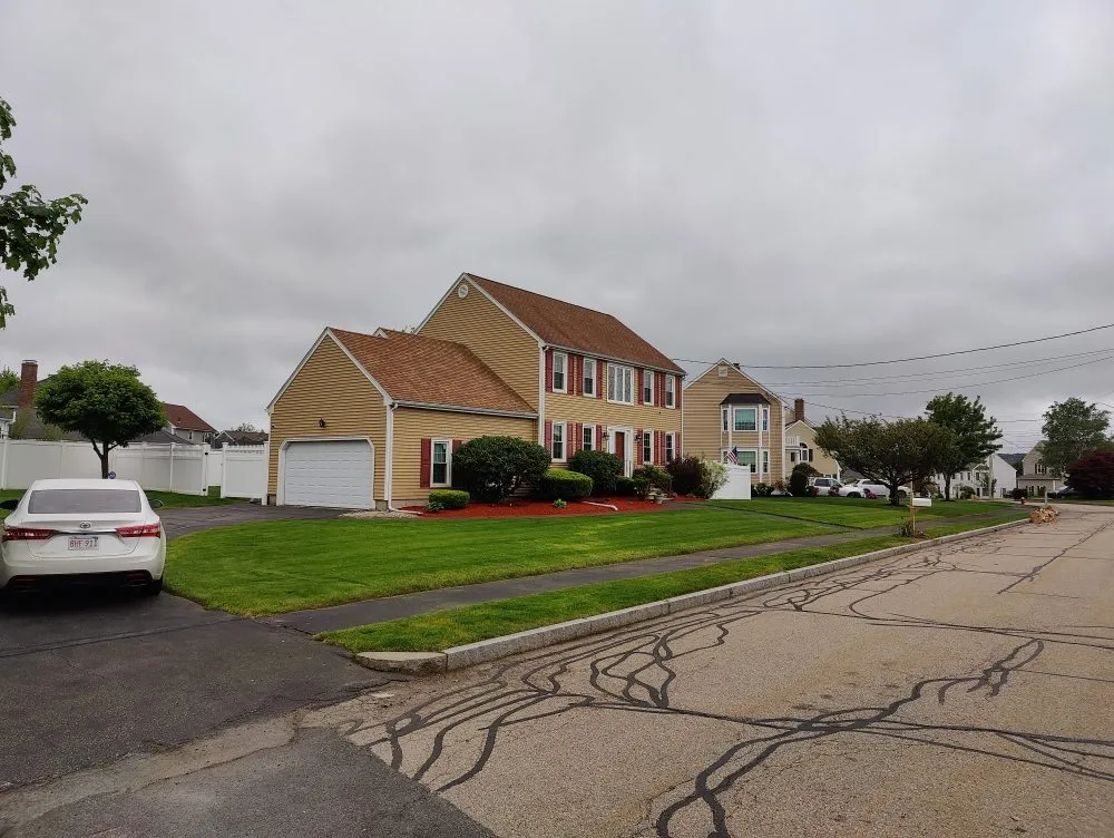 Expert lawn mowing service for residential properties across Taunton, MA - Vanusas Landscaping