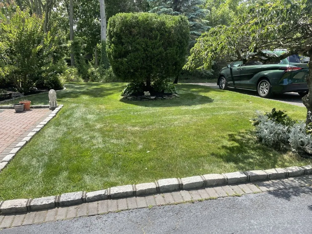 Custom outdoor landscaping with custom design in Shirley, NY by VC Landscaping