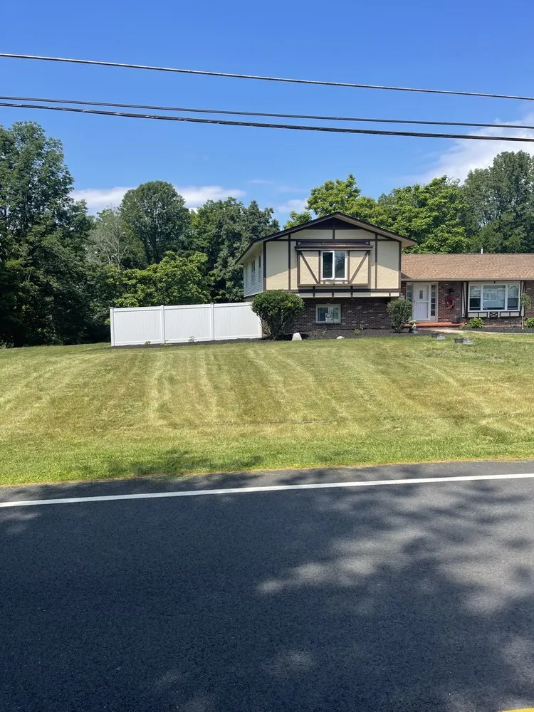 Custom lawn mowing service for residential properties in Sussex, NJ by Vealey Landscaping