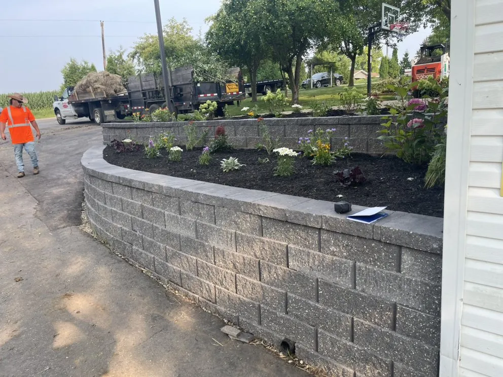 Affordable lawn mowing service for beautiful yards in Beloit, WI by Vel Men's Landscaping & Contacting