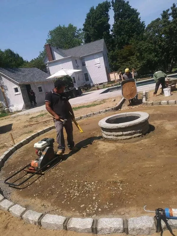 Reliable lawn mowing service for outdoor upgrades in Greenport, NY by Velasquez Landscaping & Masonry