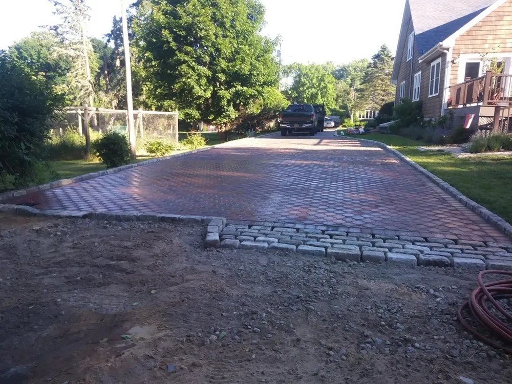 Custom yard maintenance for homes across Greenport, NY - Velasquez Landscaping & Masonry