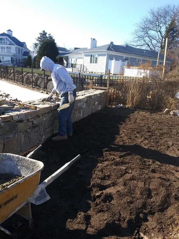 Professional lawn care service for residential properties across Greenport, NY - Velasquez Landscaping & Masonry