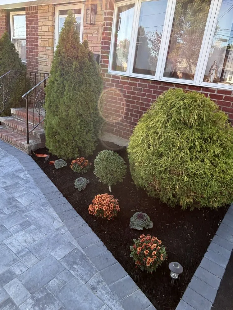Reliable lawn care service with custom design in Hicksville, NY by Velasquez Landscaping