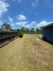 Trusted lawn mowing service for year-round maintenance in Fort Walton Beach, FL by Veloz & Cooper