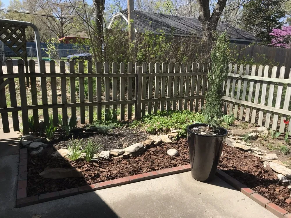 Affordable landscape installation with custom design in Emporia, KS by Venture Brothers Lawn And Landscape