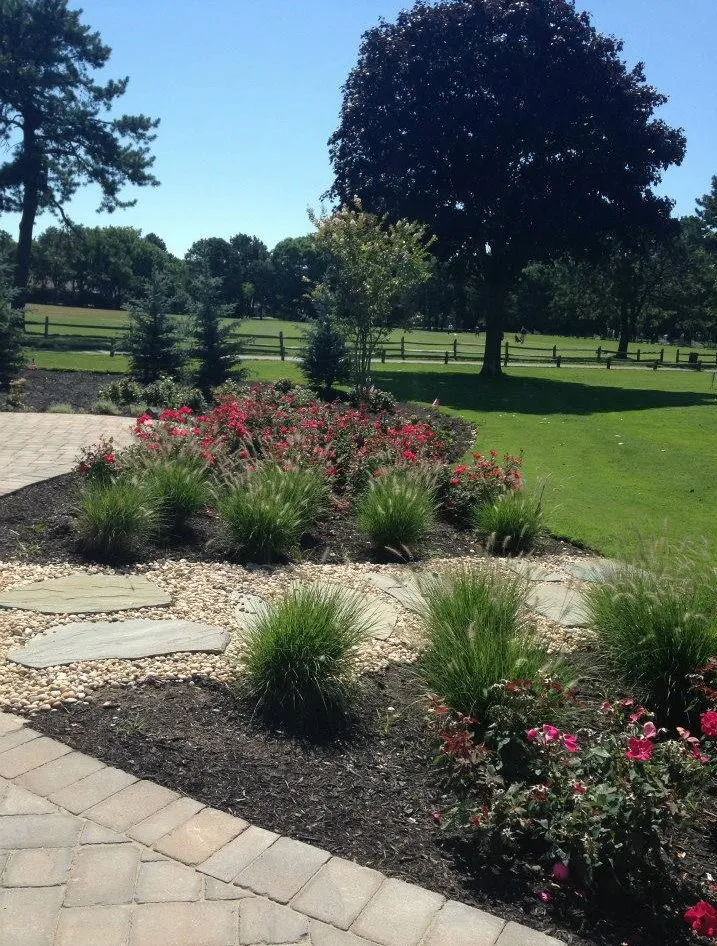 Expert outdoor landscaping for residential properties in East Patchogue, NY by Verde Domani
