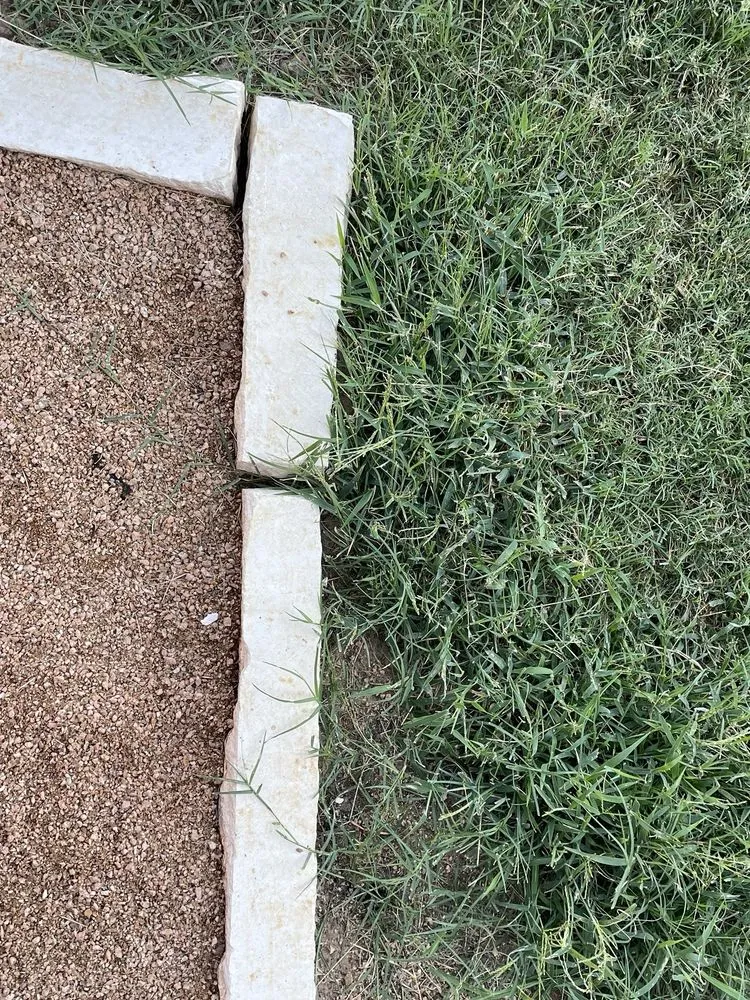 Professional lawn mowing service for residential properties in Austin, TX by Verde Lux Stone & Garden