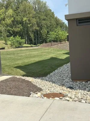 Versatile Lawn Care Logo