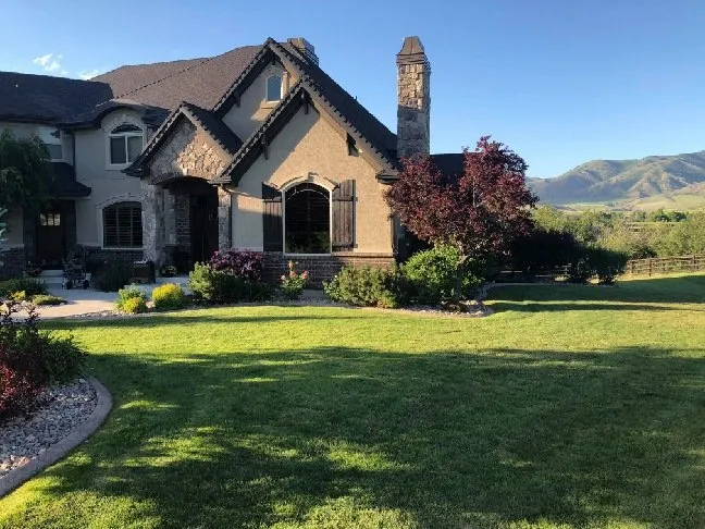 Affordable lawn mowing service with custom design across Smithfield, UT - Very Good Landscaping